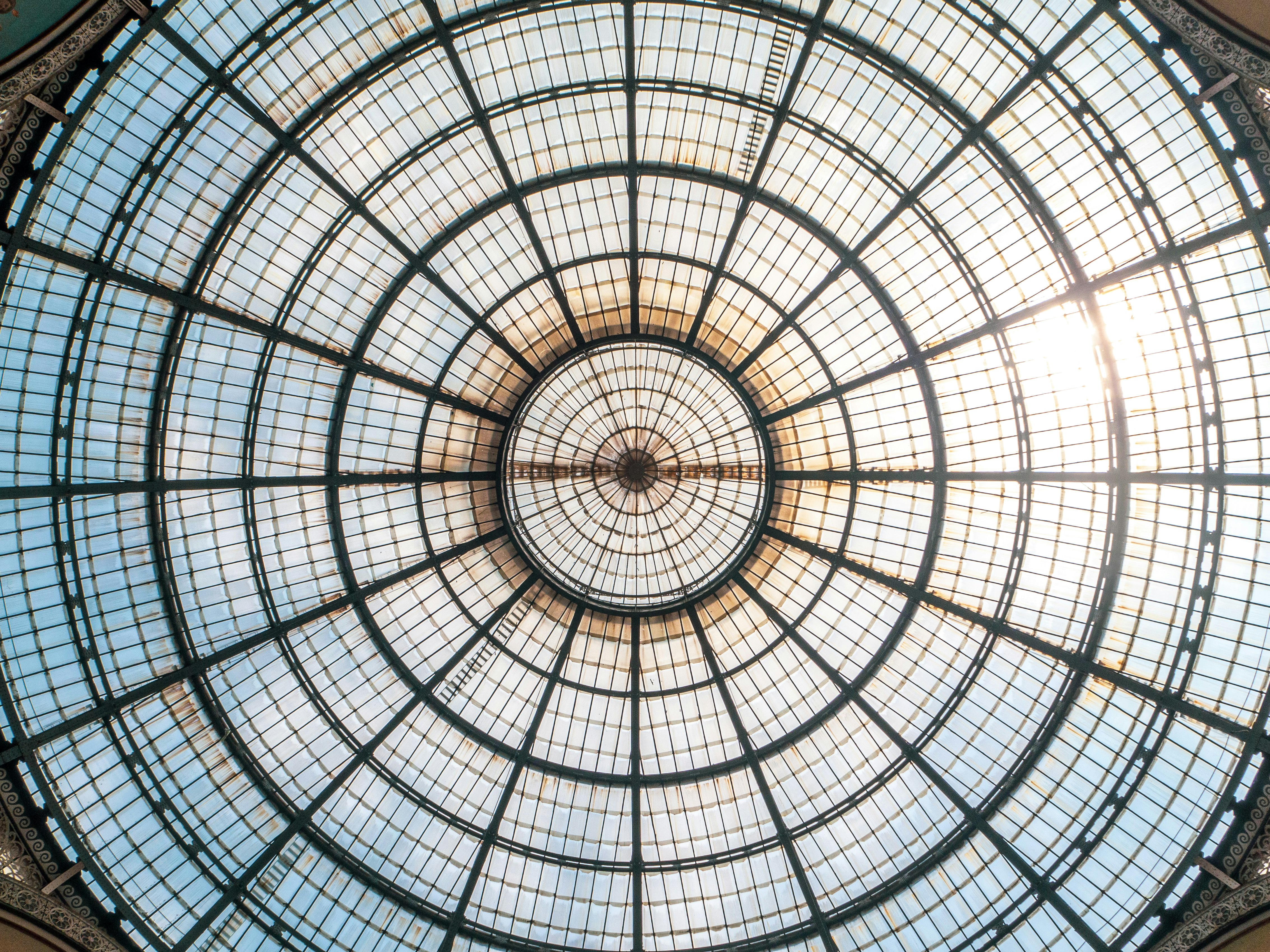 low angle view of round white metal trusses